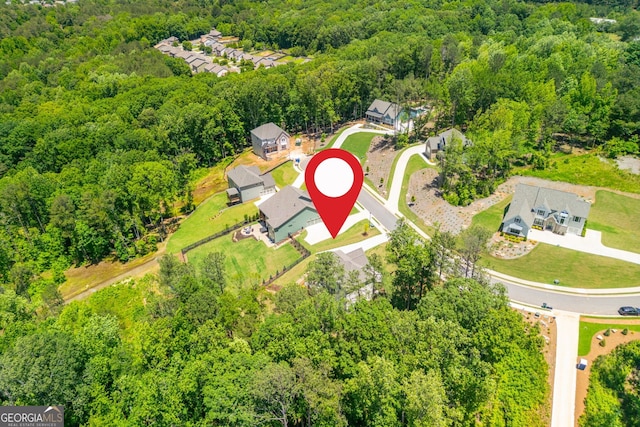 1013 Liberty Springs Dr, Woodstock, GA 30188 - aerial view of residential area with a heavily wooded area