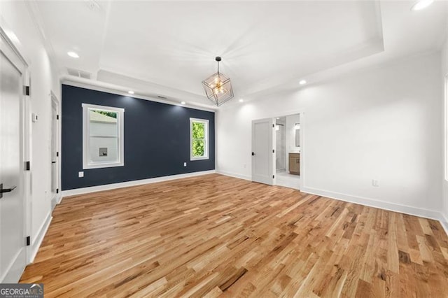 327 Ohm, Avondale Estates, GA 30002 - empty room with a raised ceiling, light wood finished floors, recessed lighting, and baseboards