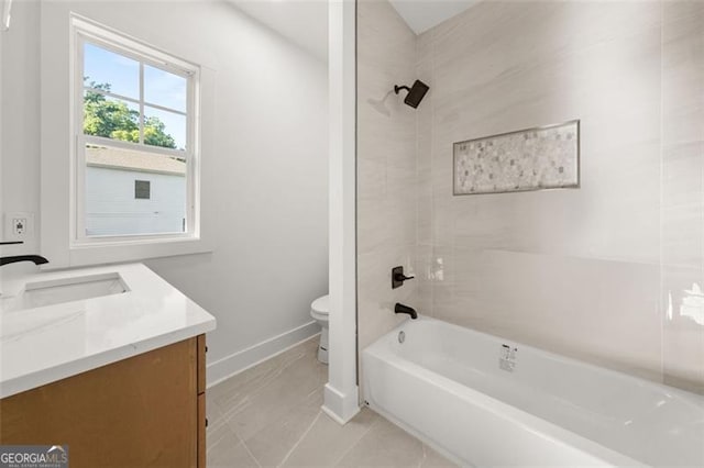 327 Ohm, Avondale Estates, GA 30002 - full bathroom featuring vanity, toilet, baseboards, shower / washtub combination, and tile patterned floors