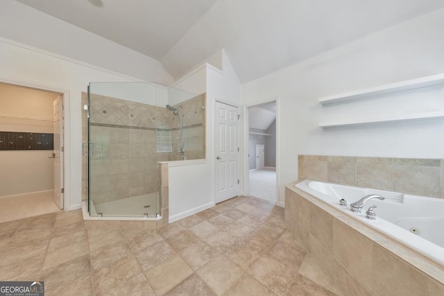 1575 Petal Pt NW, Kennesaw, GA 30152 - full bath with lofted ceiling, a stall shower, a tub with jets, a spacious closet, and baseboards