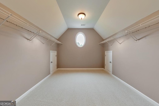 1575 Petal Pt NW, Kennesaw, GA 30152 - walk in closet with vaulted ceiling and carpet