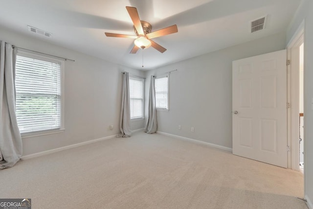 1575 Petal Pt NW, Kennesaw, GA 30152 - spare room with a ceiling fan, carpet, and baseboards