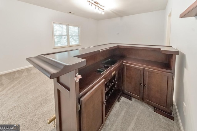 1575 Petal Pt NW, Kennesaw, GA 30152 - bar area with light colored carpet, baseboards, and rail lighting
