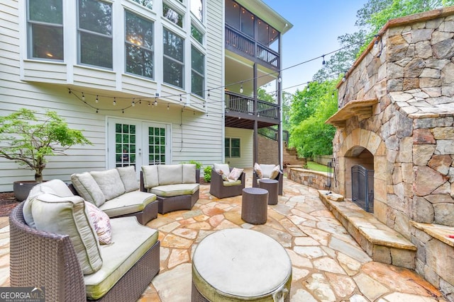 1575 Petal Pt NW, Kennesaw, GA 30152 - view of patio featuring an outdoor living space with a fireplace and french doors