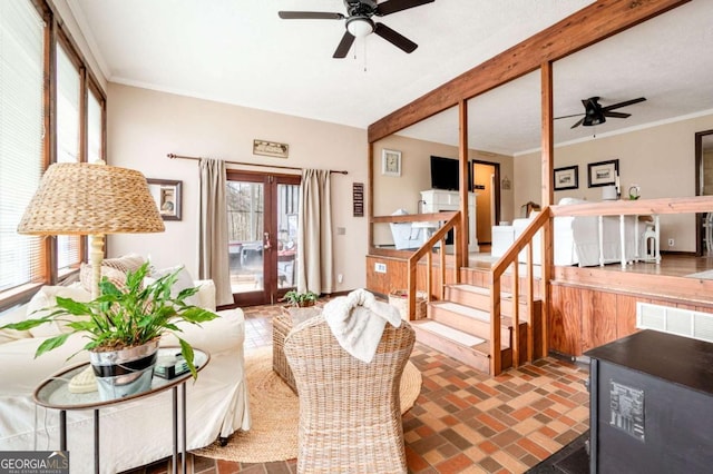 2796 County Line Rd NW, Acworth, GA 30101 - living room with ceiling fan, french doors, ornamental molding, stairway, and brick patterned flooring