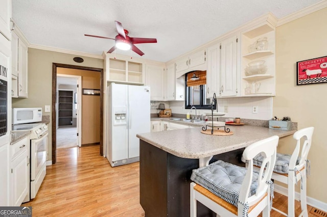 2796 County Line Rd NW, Acworth, GA 30101 - kitchen featuring white appliances, open shelves, a peninsula, a ceiling fan, and light wood-type flooring