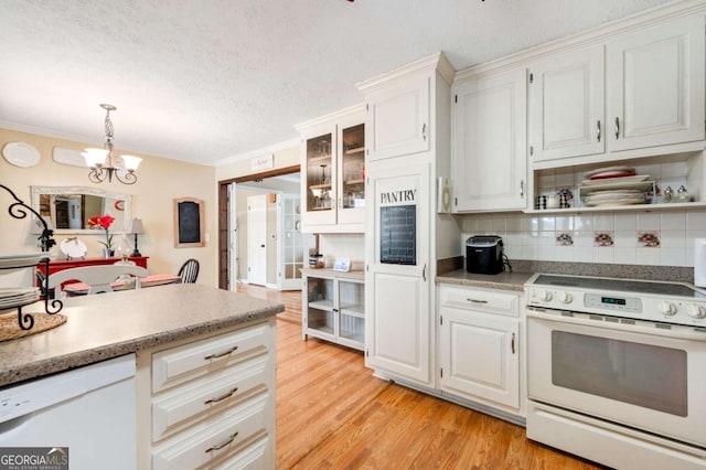 2796 County Line Rd NW, Acworth, GA 30101 - kitchen featuring white appliances, white cabinets, light wood finished floors, tasteful backsplash, and pendant lighting