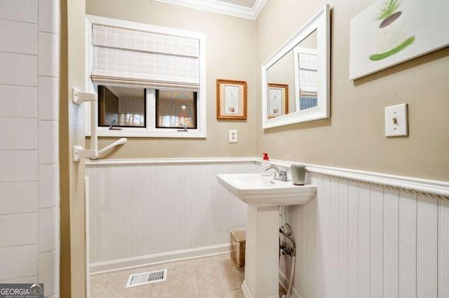 2796 County Line Rd NW, Acworth, GA 30101 - bathroom with wainscoting, ornamental molding, tile patterned floors, and a sink