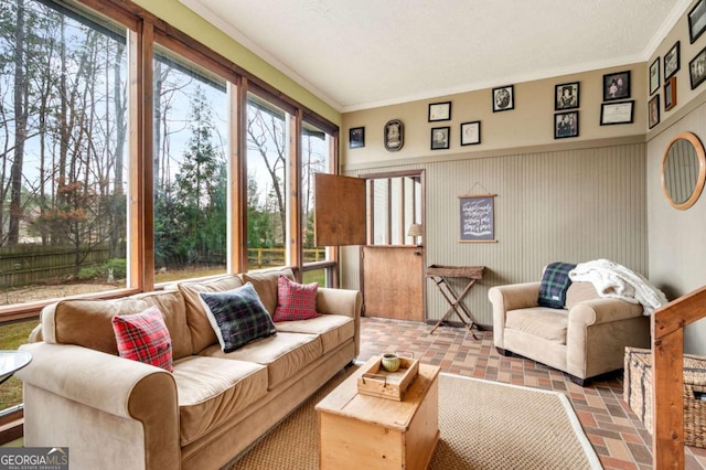 2796 County Line Rd NW, Acworth, GA 30101 - living area featuring crown molding and brick patterned floors