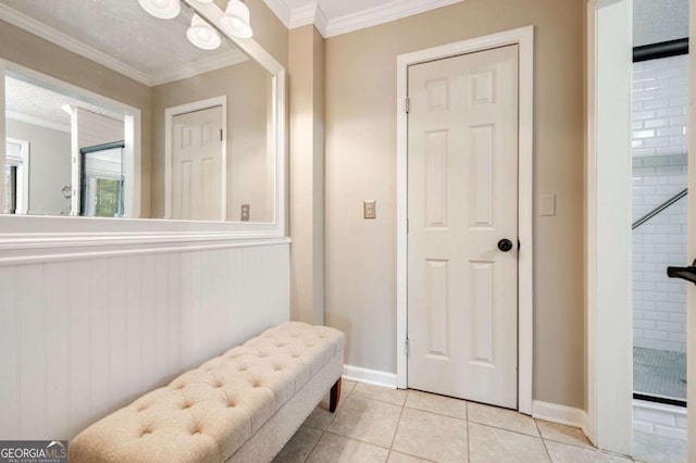2796 County Line Rd NW, Acworth, GA 30101 - entrance foyer featuring light tile patterned floors, baseboards, and crown molding