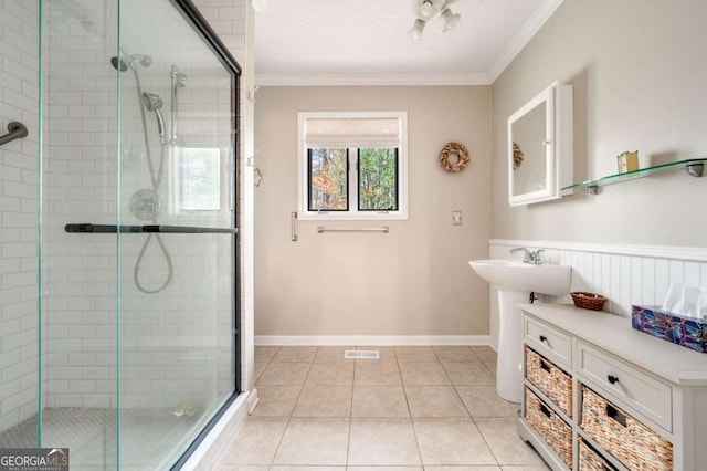2796 County Line Rd NW, Acworth, GA 30101 - bathroom with crown molding, a shower stall, and tile patterned floors