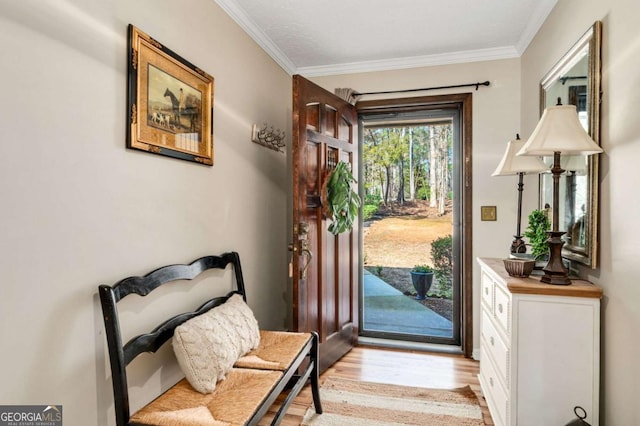 2796 County Line Rd NW, Acworth, GA 30101 - entryway featuring light wood finished floors and crown molding