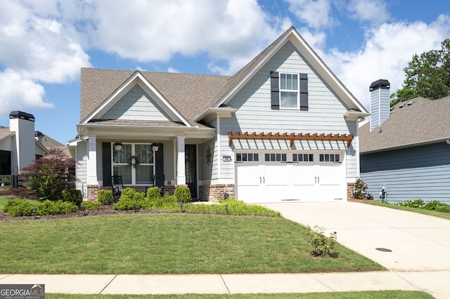 80 Azalea Xing, Dallas, GA 30132 - craftsman-style home with a front yard, an attached garage, concrete driveway, covered porch, and brick siding