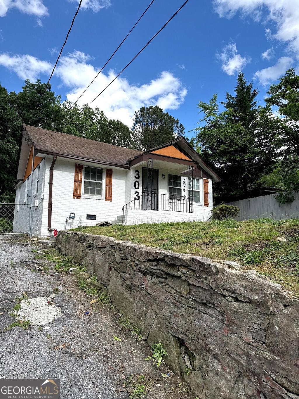 303 Anderson Ave NW, Atlanta, GA 30314 - bungalow-style home featuring brick siding and a porch