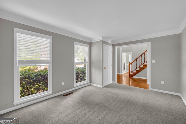 2151 Hamstead Ct, Suwanee, GA 30024 - spare room with carpet flooring, crown molding, baseboards, and stairway