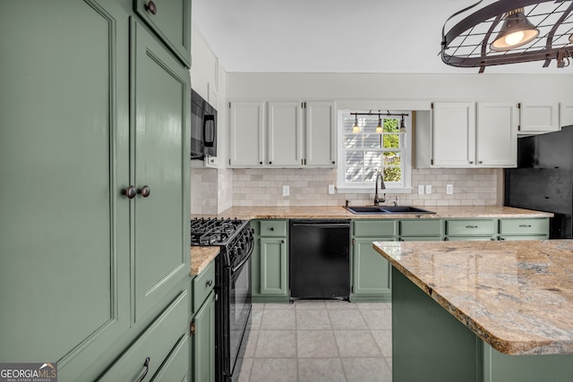 2151 Hamstead Ct, Suwanee, GA 30024 - kitchen featuring green cabinetry, black appliances, a sink, backsplash, and white cabinetry