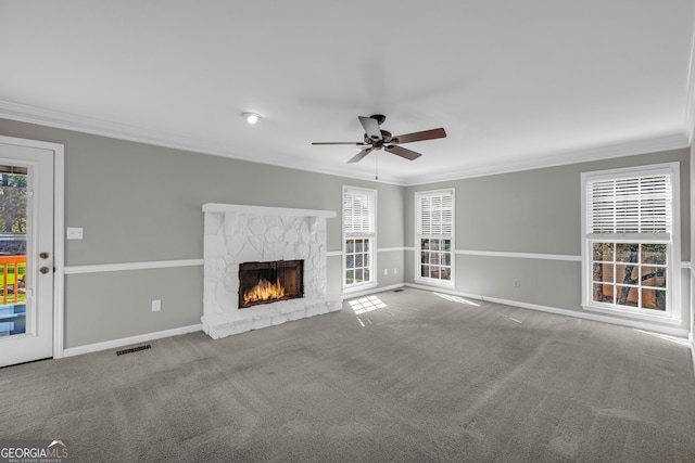 2151 Hamstead Ct, Suwanee, GA 30024 - unfurnished living room with ornamental molding, ceiling fan, plenty of natural light, a fireplace, and baseboards