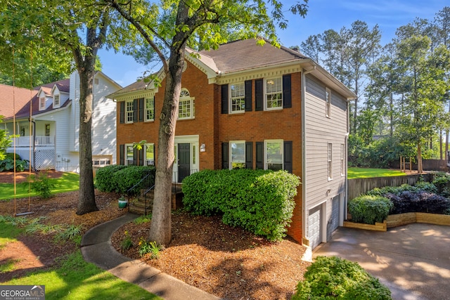 2151 Hamstead Ct, Suwanee, GA 30024 - view of front of house with concrete driveway and an attached garage