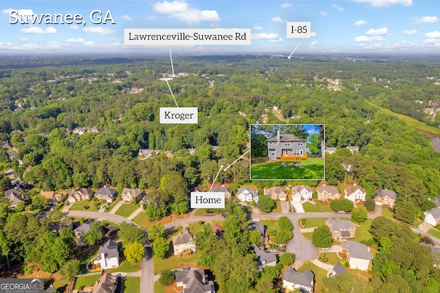 2151 Hamstead Ct, Suwanee, GA 30024 - aerial perspective of suburban area featuring a heavily wooded area and property boundaries highlighted
