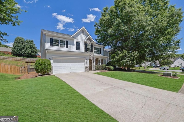 955 Mill Creek Ave, Canton, GA 30115 - traditional home featuring an attached garage, driveway, and stone siding