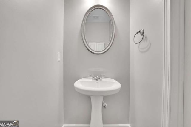 955 Mill Creek Ave, Canton, GA 30115 - bathroom featuring baseboards