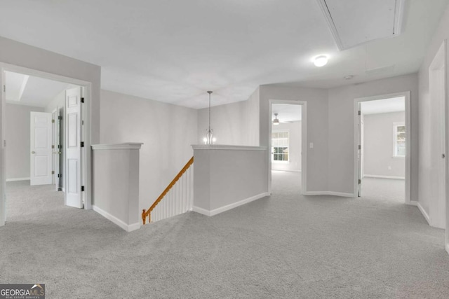 955 Mill Creek Ave, Canton, GA 30115 - unfurnished room featuring attic access, carpet, and healthy amount of natural light