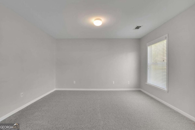 955 Mill Creek Ave, Canton, GA 30115 - carpeted spare room featuring baseboards
