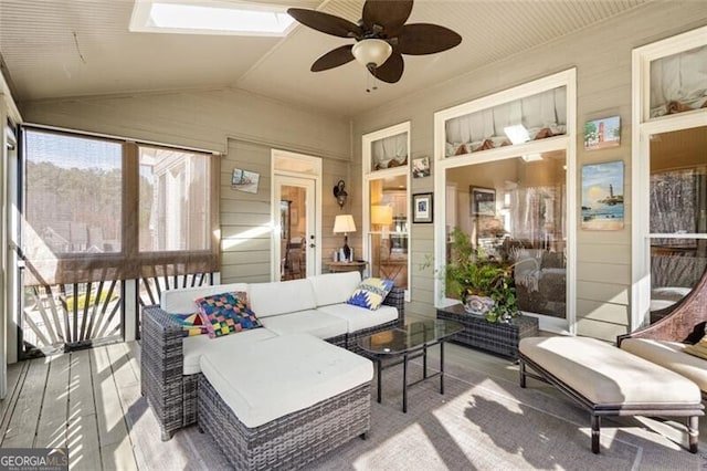4115 Gold Mill Rdg, Canton, GA 30114 - sunroom / solarium featuring a ceiling fan, lofted ceiling, an outdoor hangout area, and a skylight