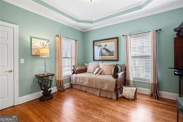 4115 Gold Mill Rdg, Canton, GA 30114 - bedroom featuring light wood finished floors, ornamental molding, baseboards, and a tray ceiling
