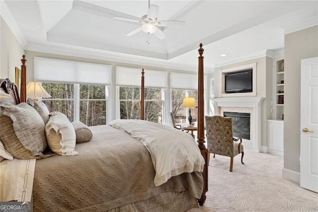 4115 Gold Mill Rdg, Canton, GA 30114 - carpeted bedroom featuring a premium fireplace, crown molding, a raised ceiling, and ceiling fan