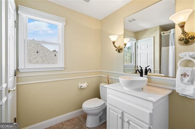 4115 Gold Mill Rdg, Canton, GA 30114 - full bathroom featuring vanity, healthy amount of natural light, baseboards, and toilet