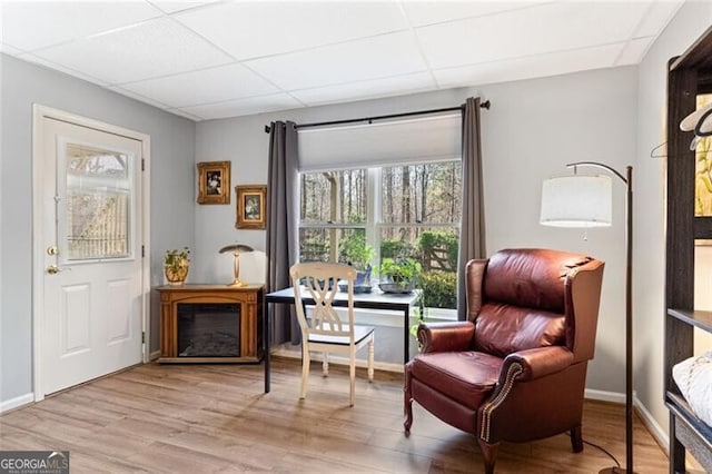 4115 Gold Mill Rdg, Canton, GA 30114 - sitting room with a paneled ceiling, wood finished floors, and baseboards