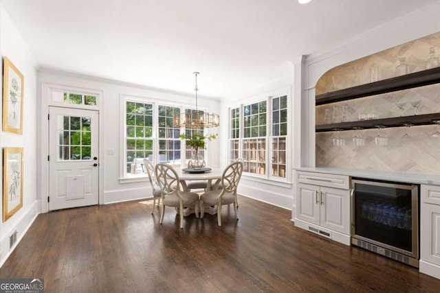 5120 Falcon Chase Ln, Atlanta, GA 30342 - dining area with beverage cooler, plenty of natural light, dark wood-style floors, and baseboards