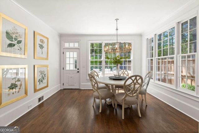 5120 Falcon Chase Ln, Atlanta, GA 30342 - dining room featuring a chandelier, crown molding, healthy amount of natural light, dark wood-type flooring, and baseboards