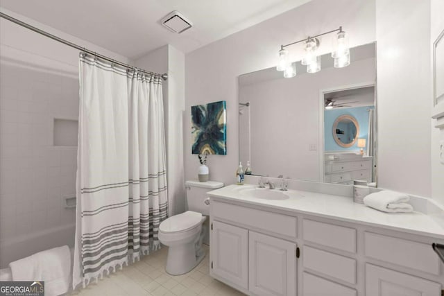 5120 Falcon Chase Ln, Atlanta, GA 30342 - bathroom featuring toilet, vanity, a ceiling fan, shower / bath combo with shower curtain, and tile patterned floors