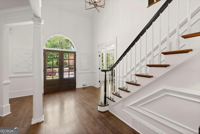 5120 Falcon Chase Ln, Atlanta, GA 30342 - entryway with a towering ceiling, wood finished floors, stairway, baseboards, and french doors