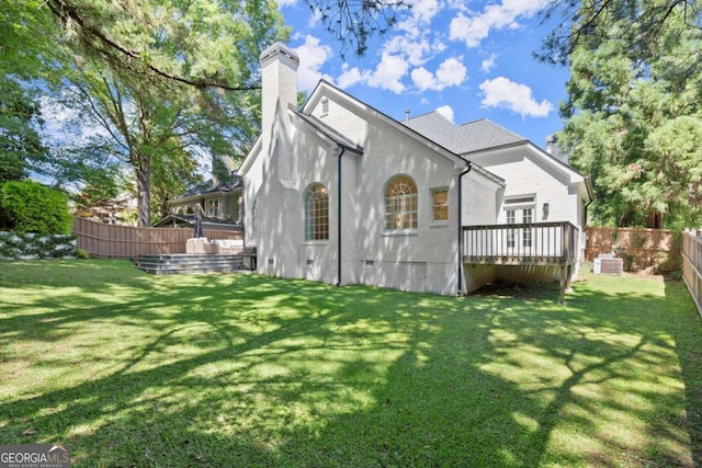 5120 Falcon Chase Ln, Atlanta, GA 30342 - back of property with a chimney, a wooden deck, crawl space, central AC, and stucco siding
