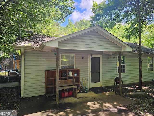 406 Harmon Ave, Carrollton, GA 30117 - rear view of house with a trampoline
