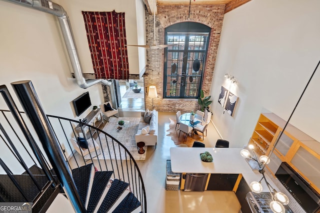 170 Boulevard E414, Atlanta, GA 30312 - living room with a high ceiling and stairs