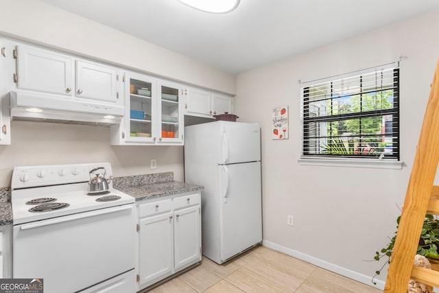 39 Helmsman Ct, Savannah, GA 31410 - kitchen featuring white appliances, under cabinet range hood, white cabinets, and glass insert cabinets