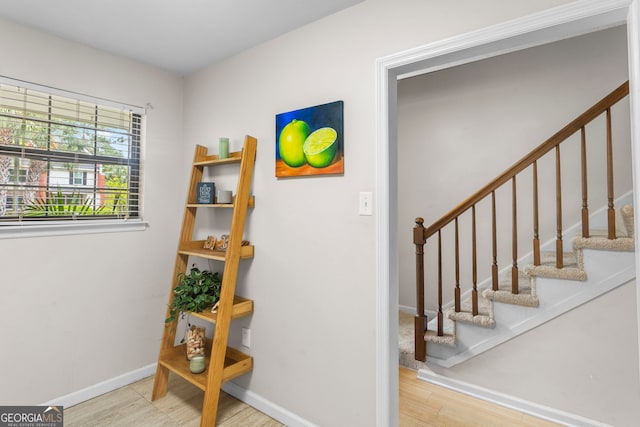 39 Helmsman Ct, Savannah, GA 31410 - staircase with baseboards and wood finished floors