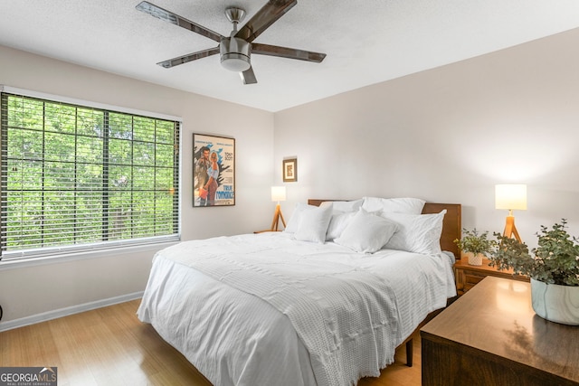 39 Helmsman Ct, Savannah, GA 31410 - bedroom with light wood-type flooring and ceiling fan
