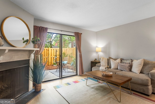 39 Helmsman Ct, Savannah, GA 31410 - living room featuring wood finished floors and a multi sided fireplace