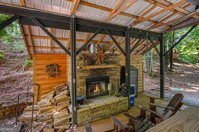 44 11th St, Ellijay, GA 30540 - view of patio / terrace with an outdoor stone fireplace