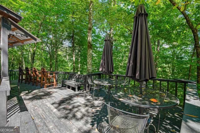 44 11th St, Ellijay, GA 30540 - wooden terrace with outdoor dining space