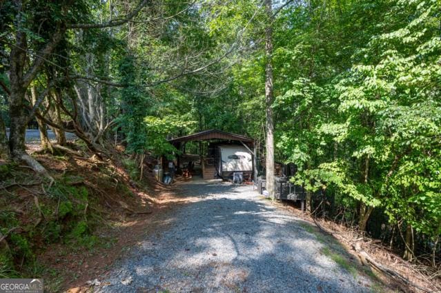 44 11th St, Ellijay, GA 30540 - view of dirt / gravel road featuring a forest view