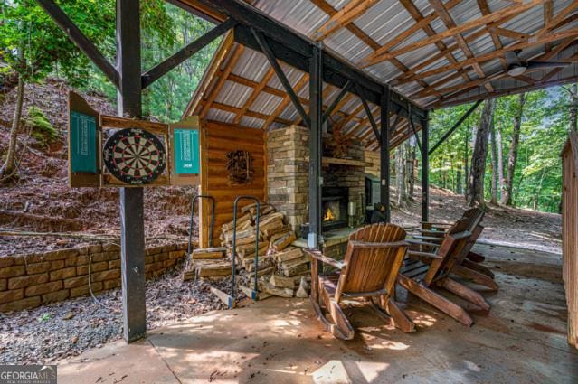 44 11th St, Ellijay, GA 30540 - view of patio featuring an outdoor stone fireplace