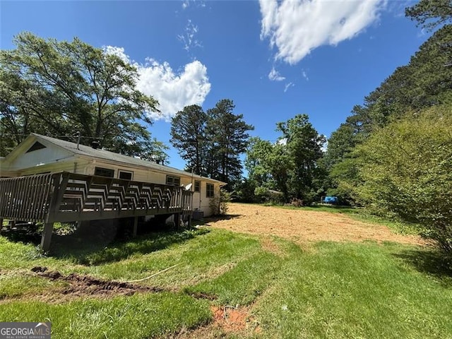 1272 Cave Springs Rd, Douglasville, GA 30134 - view of green lawn featuring a deck