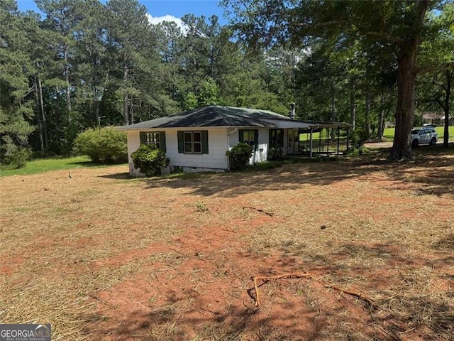 1272 Cave Springs Rd, Douglasville, GA 30134 - view of front of house with a carport