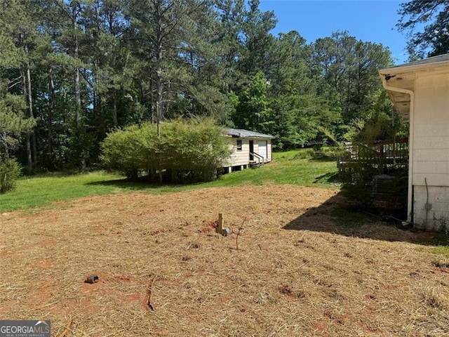 1272 Cave Springs Rd, Douglasville, GA 30134 - view of green lawn featuring an outdoor structure